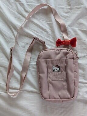 Herschel x Hello Kitty Pink Crossbody Bag with Red Bow Accent